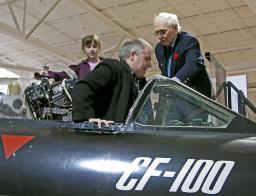 Hans gets into the cockpit of a CF-100