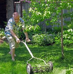 Hans mowing his lawn