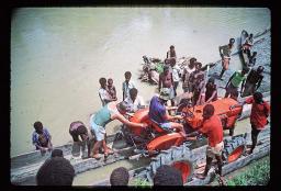 Will a tractor float on two canoes?