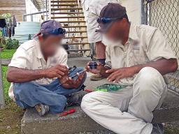 Repair technicians in their laborotory