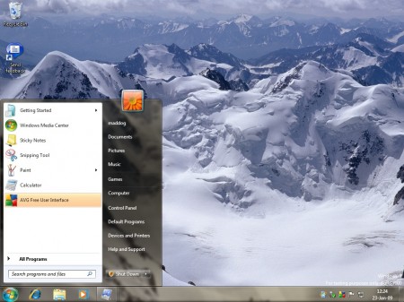 Windows 7 desktop with "Landscape" theme and start menu showing