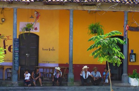 El Salvador - men gossiping in the village of Suchitoto - Heidi Majano