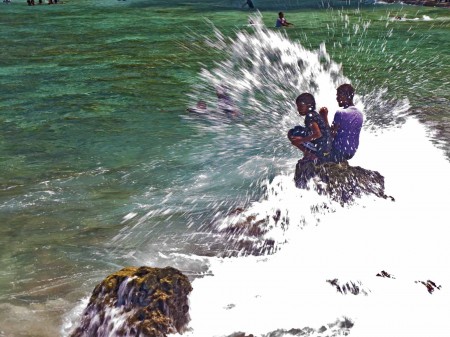 Surfer girls getting very wet