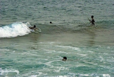Kids surfing on Coronation Drive