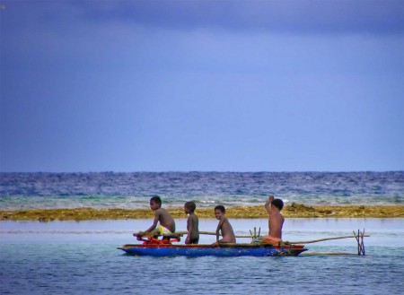 Boys in a canoe at Blueblood Boys in a canoe at Blueblood