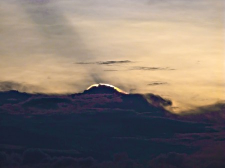 Lenticular cap on a Cumulonimbus at sunset