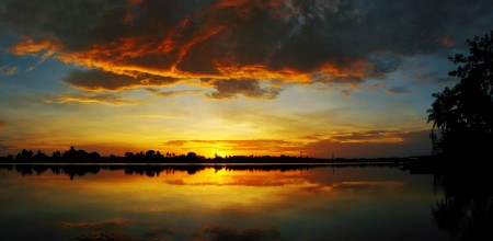 Sequential Sunrise at Madang - Clouds Catching Fire