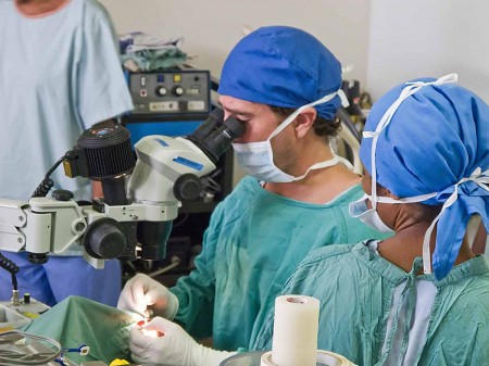Dr. Matt performing eye surgery on a patient