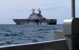 Meeting the USS Peleliu at sea